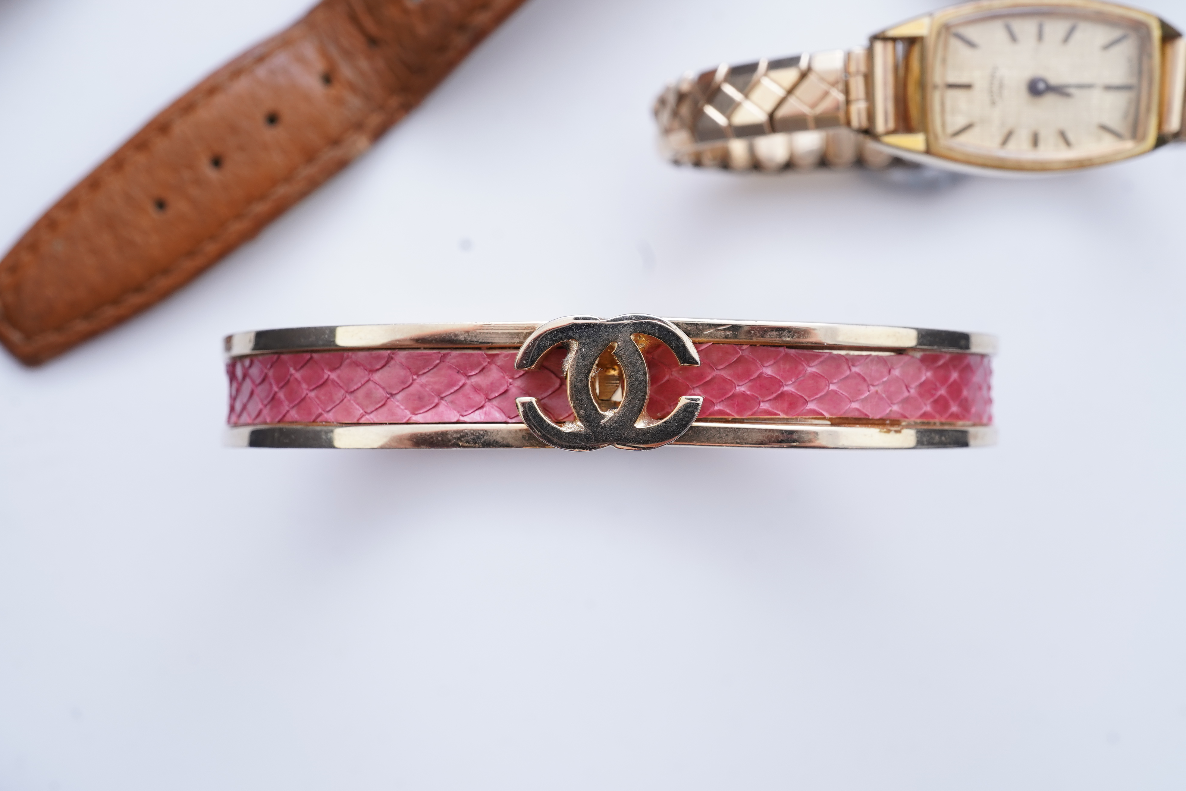 XX REMOVE ROLEX XX, A collection of watches and a bangle, comprising: two Seiko quartz watches; a manual winding watch by Larex; a quartz watch by Eterna; a quartz watch by Rotary; and a quartz watch by Pulsar; together